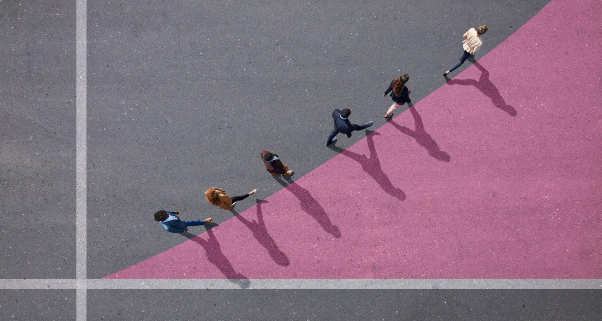 Businesspeople walking on painted up going graph, on asphalt